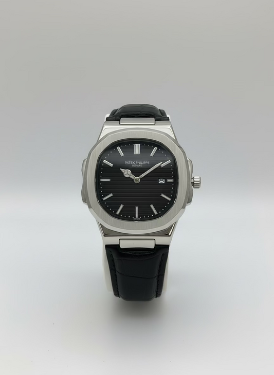 Patek Philippe watch on a white stand with a colorful abstract background